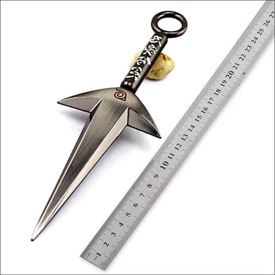 Decorative sword with a star-shaped blade next to a ruler on a white background