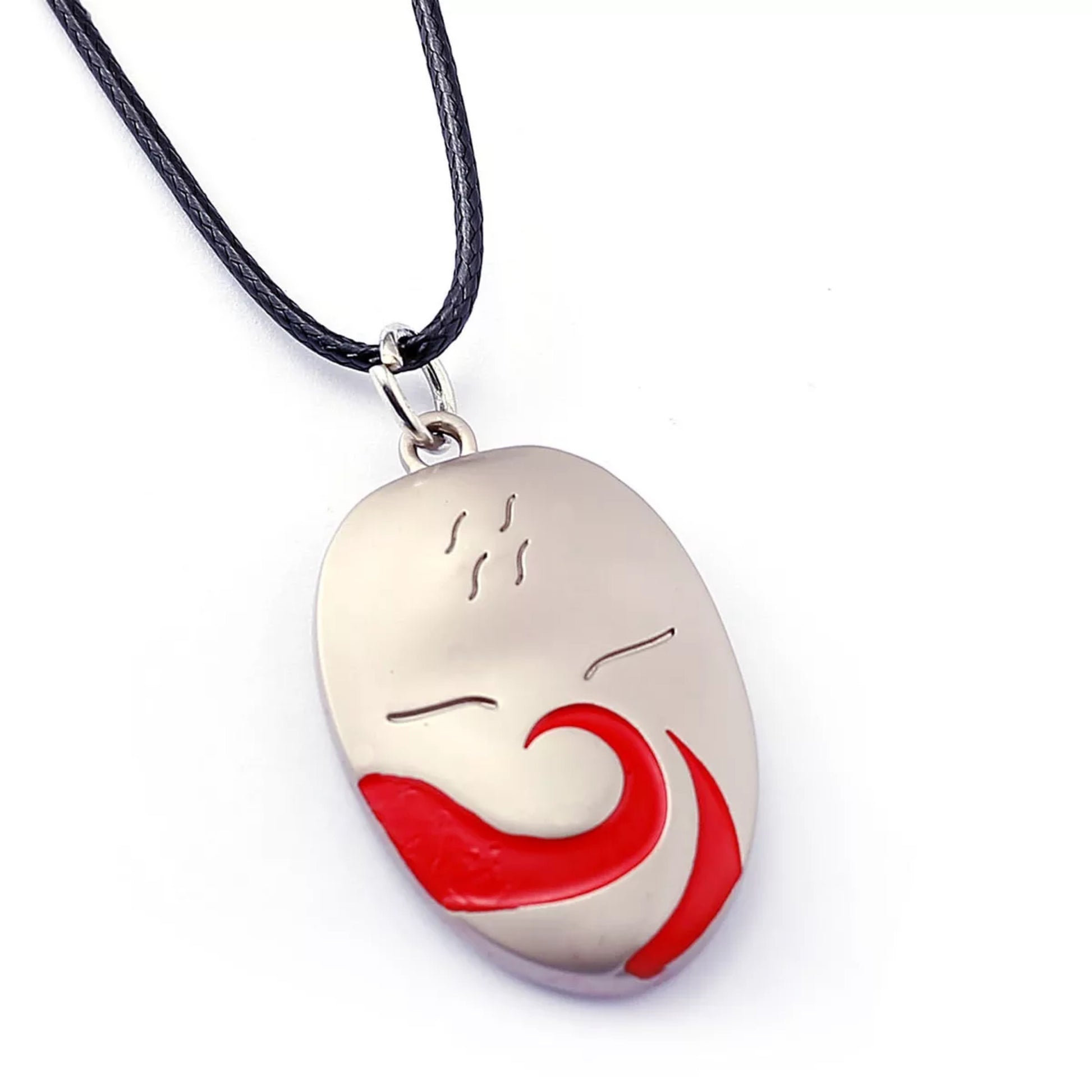 Pendant with red and white design on a black cord against a white background