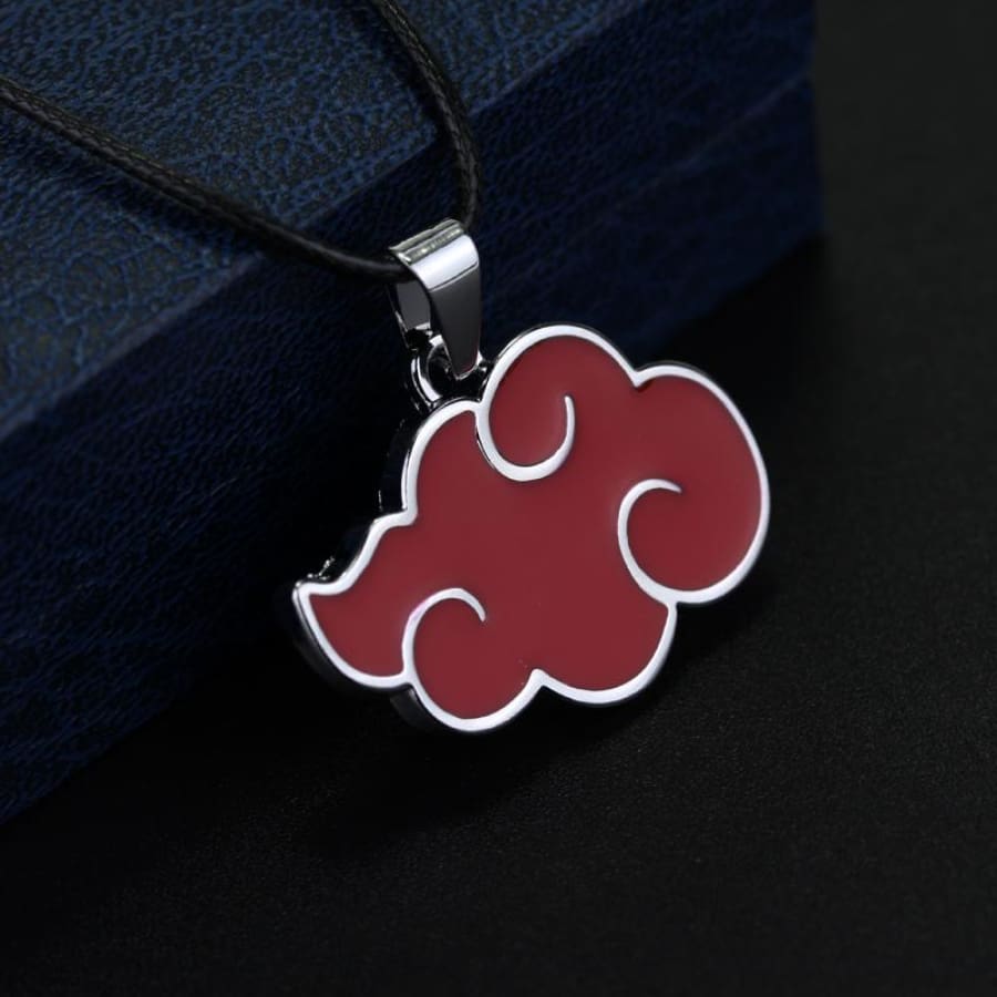 Red cloud-shaped pendant on a black background