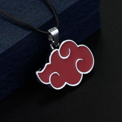 Red cloud-shaped pendant on a black background