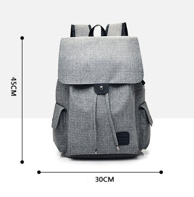 Gray backpack with dimensions indicated on a white background