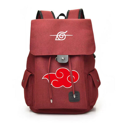 Red backpack with anime-themed designs on a white background