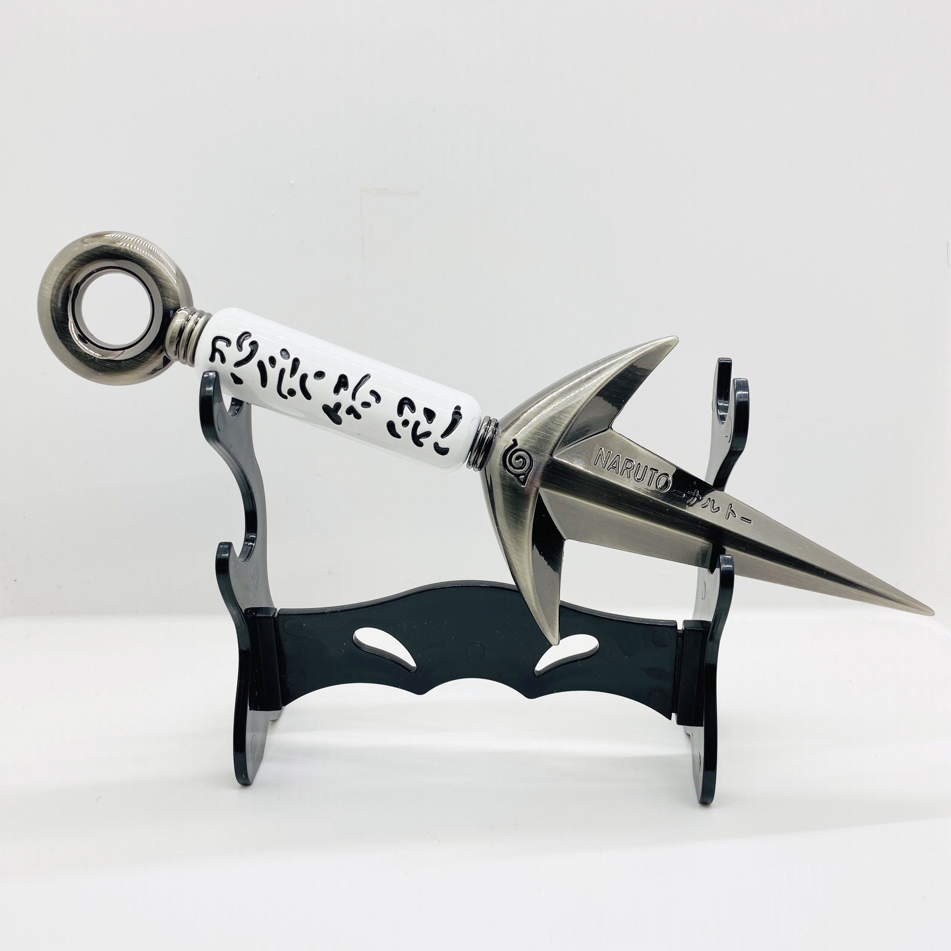Metallic kunai on a white background