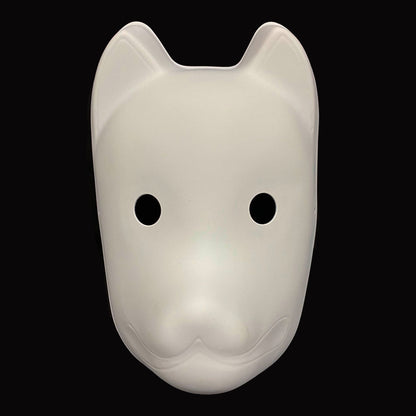 White dog mask with black eyes on a black background